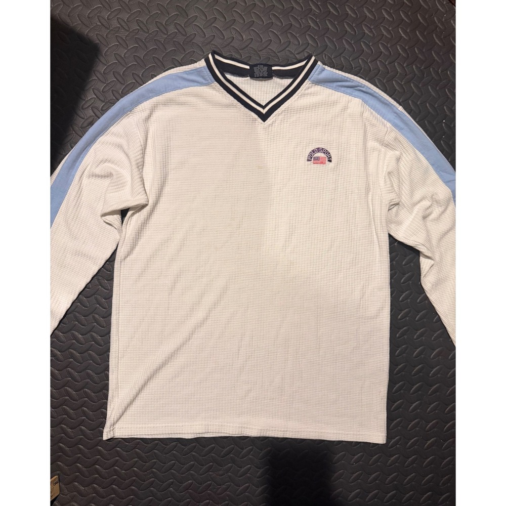 Polo Sport long sleeve shirt with blue shoulder panels and black trim
Size L